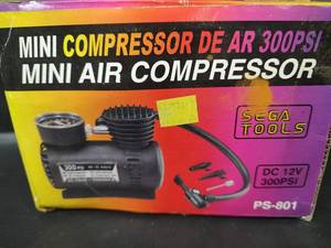 lot 381 image: NIB Sega Tools Mini Air Compressor 12V