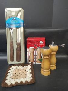lot 406 image: NIP Farberware Wood Pepper Mill and Salt Shaker, Chicago Cutlery and Hot Pad