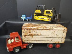 lot 414 image: Vintage STRUCT Turbine Toy Semi Truck and Trailer with Metal Bulldozer and Truck