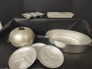 lot 415 image: Aluminum Cookware Muffin Pan, Ice Cube Tray, Domed Pot, Oval Roaster, 3 Plates