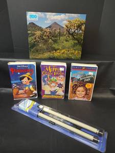 lot 421 image: 500 Piece Puzzle, 3 VHS Tapes and Roller Shade