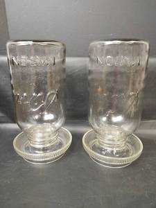 lot 436 image: Vintage Glass Chicken Waterers, Kerr Jars with Base