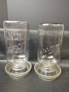lot 437 image: Vintage Glass Ball and Kerr Chicken Waterers with Bases