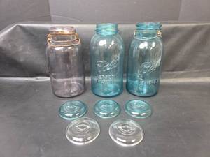 lot 463 image: 2qt Ball Perfect Mason and Ideal Canning Jars (blue) and Ball Sure Seal (purple) Canning Jar with 5 Glass Lids