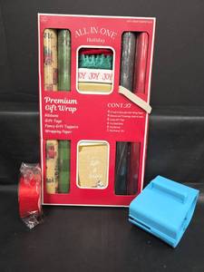 lot 472 image: All-in-One Holiday Premium Gift Wrap Set 27 Count with Ribbon and Paper Cutter