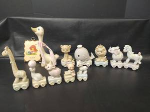 lot 521 image: Enesco 1985 and 1987 Precious Moments Train Figurines and More