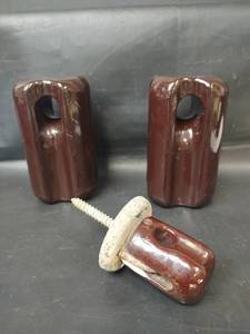 lot 528 image: Vintage Brown Glazed Guy Strain Electric Insulator and Smaller Insulator