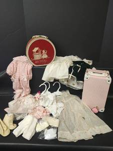 lot 534 image: Vintage Round Red Carrying Case, Pink Striped Suitcase and Clothes