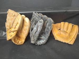 lot 614 image: Assorted Ball Gloves, One is Vintage