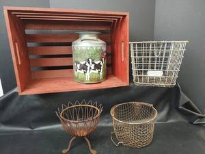 lot 616 image: Red Wood Slat Crate, Cow Print Milk Can, Two Wire Baskets with Wire Planter Stand
