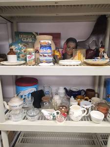 lot 641 image: Assorted Household Lot Budweiser 2000 Stein, Miller High Life Can Bank, Mugs, Glassware, Depression Glass Collectors Guides, and More