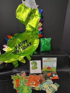 lot 673 image: Dinosaur Birthday Party Supply Lot, Foil Balloon, Number 2 Cake Topper