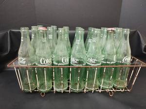 lot 689 image: Vintage Coca-Cola 10 FL OZ Glass Bottles with Wire Carrier