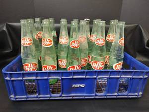 lot 690 image: Vintage Dr Pepper 10 fl oz Glass Bottles with Pepsi Carrier