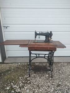 lot 801 image: Vintage Honeymoon Sewing Machine with Cabinet and Treadle Stand