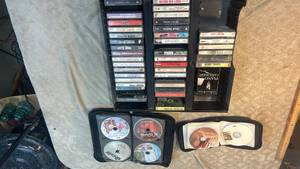 lot 5 image: DVD and CD Collection Lot 75 Discs Movies Music 25 tapes also with organizer