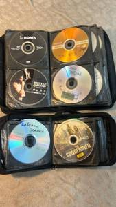 lot 7 image: Lot of 75 DVD and DVDR Discs in Black Carrying Cases some burnt disc