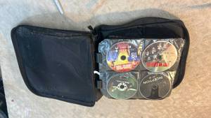 lot 8 image: CD DVD Storage Case with 40ish Assorted Discs
