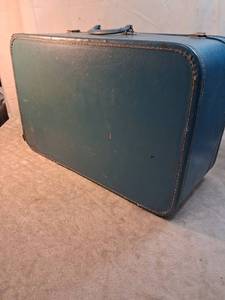 lot 63 image: Blue Hardside Suitcase with Brass Latches and Handle