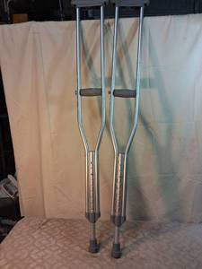 lot 73 image: Pair of Aluminum Crutches with Height Adjustment Markings