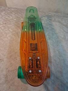 lot 82 image: Madd Gear Skateboard with LED Lights Green Orange