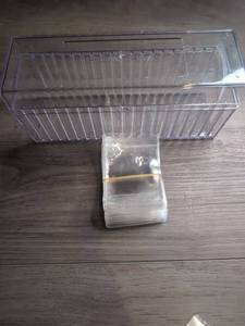 lot 523 image: Clear Card Storage Box with Lid  Stack of Clear Coin Holders