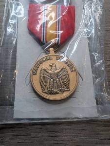 lot 560 image: National Defense Medal with Ribbon and Ribbon Bar