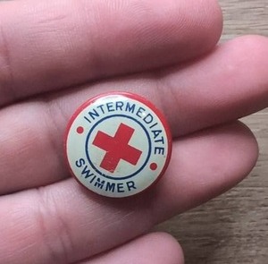 lot 565 image: Vintage Red Cross Intermediate Swimmer Round Pin Badge&nbsp