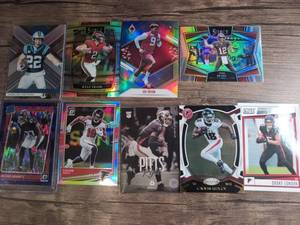 lot 1014 image: NFL Football Card Lot of 9 Including Tom Brady, McCaffrey, Ridley, Pitts, London - NFC South