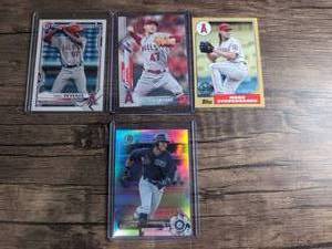 lot 1108 image: Baseball Card Lot of 4 Kyle Lewis Noah Syndergaard Griffin Canning Trent Deveaux - AL West