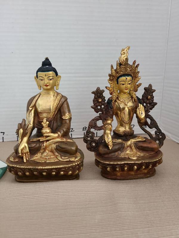 lot 1008 image: Set of 2 seated deity figurines, mixed metals, on lotus bases, 6in tall, with mirror base