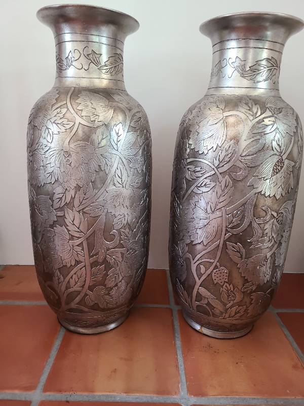 lot 1020 image: Pair Engraved Metal Floral Vases, 29.5in tall each, protective felt base