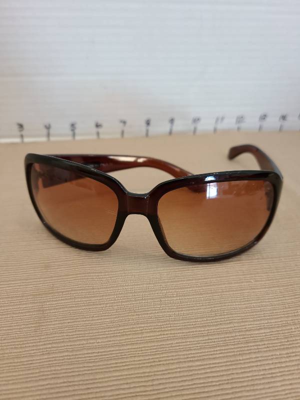 lot 1043 image: Coach Sunglasses Brown Frame Brown Lens