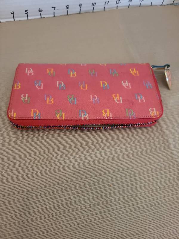 lot 1047 image: Dooley and Bourke zippered wallet, mildly stained on one side