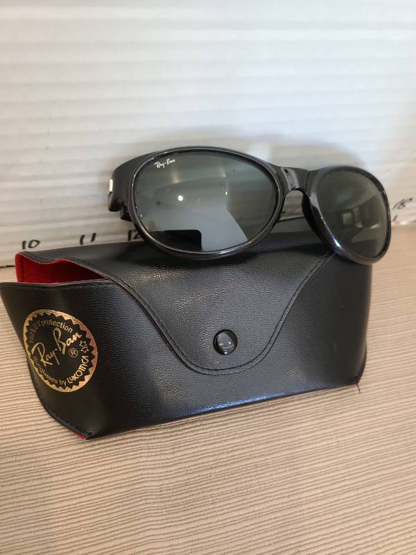 lot 1050 image: Ray-Ban sunglasses and case