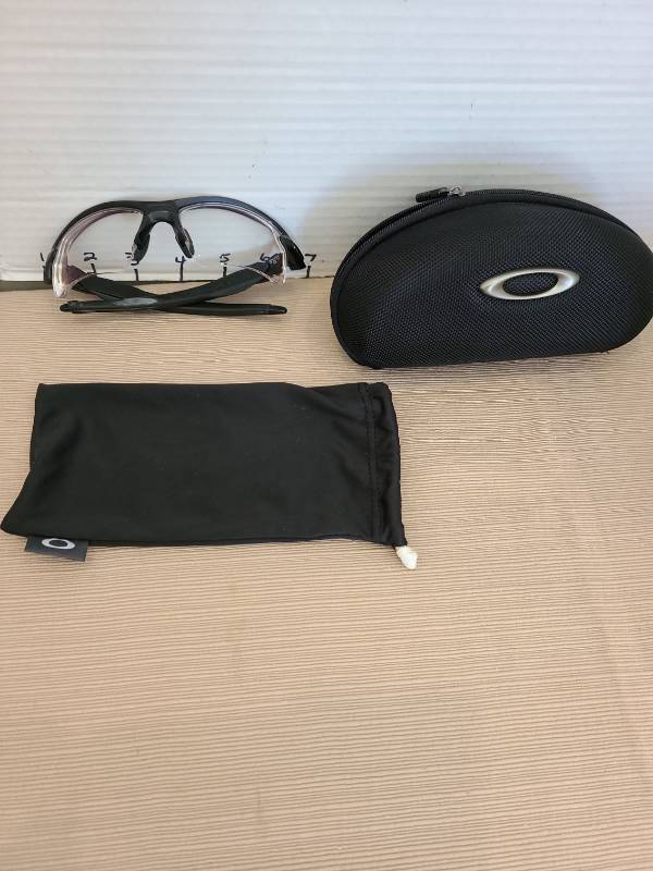 lot 1052 image: Oakley Eyewear Frame with Clear Lenses, Hard Zip Case and Pouch
