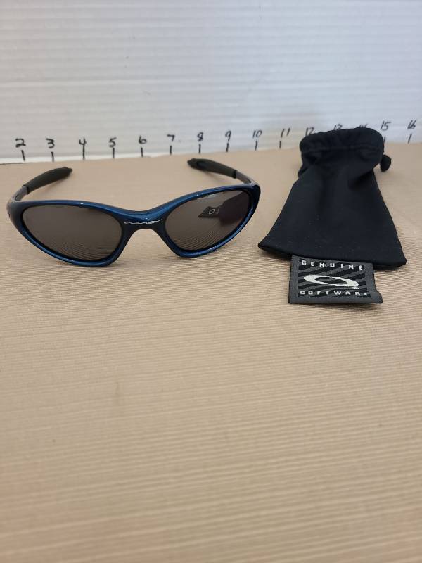 lot 1053 image: Oakley Sunglasses with Drawstring Pouch