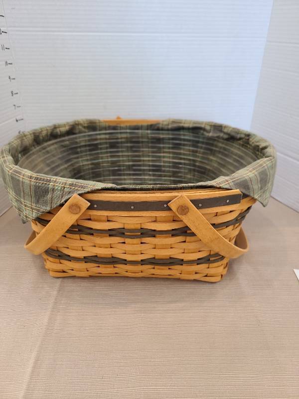 lot 1069 image: Longaberger Handwoven Basket with Handles and Fabric Liner, 6.5x15x13
