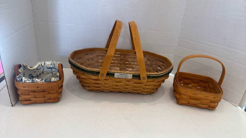 lot 1100 image: Longaberger Baskets Lot of 3 Natures Garland 2006, Hostess Appreciation 1996, and Longaberger Sweet Basil Basket