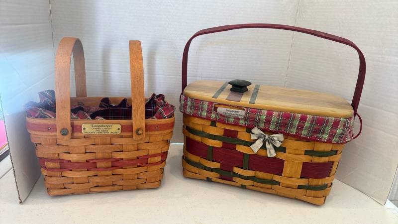 lot 1102 image: Longaberger Christmas Seasons Greetings 1992 and Wrap It Up 2008 Baskets