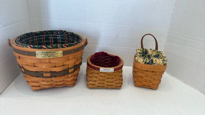 lot 1105 image: Longaberger Basket Lot of 3 Jingle Bell 1994 and 2005 Hostess Appreciation and Longaberger Chive Basket