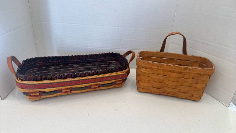 lot 1106 image: Longaberger Personal Organizer Basket from the 1997 Fathers Day Series and Longaberger Small Key Basket
