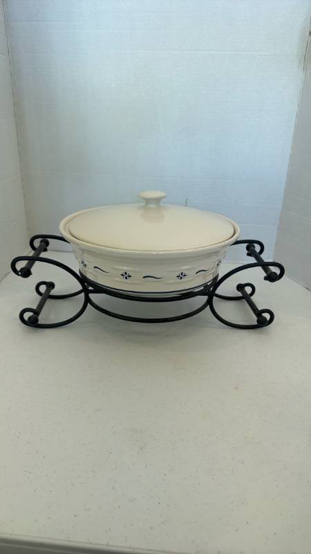 lot 1109 image: Longaberger Woven Traditions Pottery Heritage Covered Casserole with iron stand