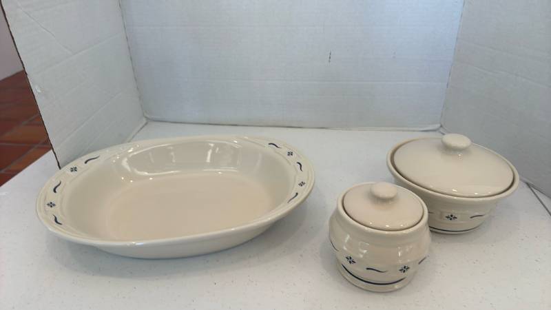 lot 1125 image: Longaberger Pottery Woven Traditions oval vegetable or serving bowl, butter tub with lid and sugar bowl with lid