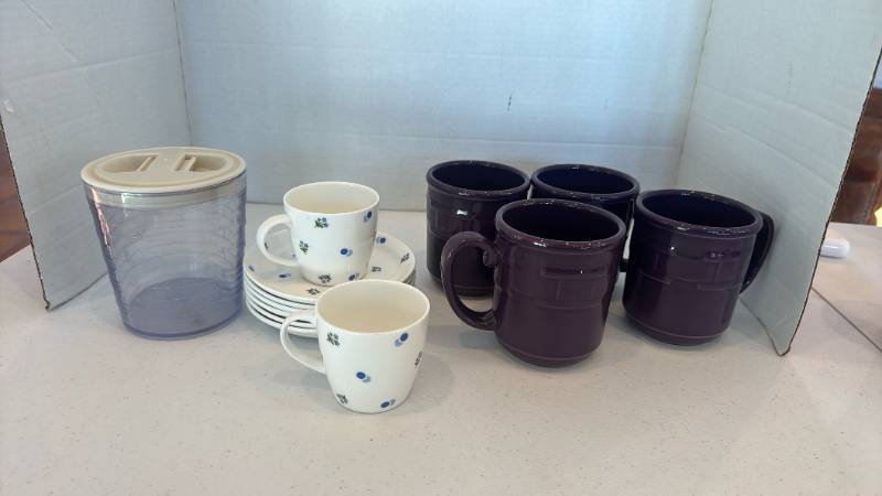 lot 1131 image: Longaberger Woven Traditions Eggplant ceramic mugs,  Longaberger Canister Protector and Lid and Ivy bone China tea cups and saucers
