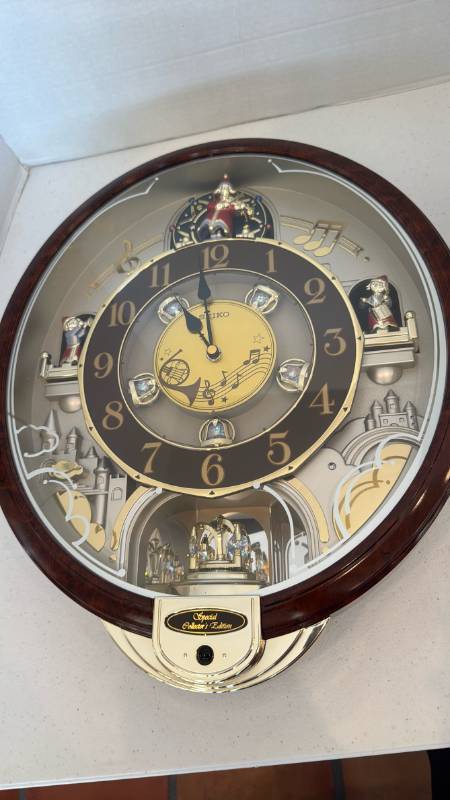 lot 1141 image: Seiko Melodies in Motion Musical Wall Clock 17x14
