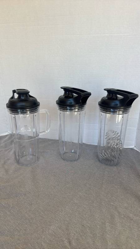 lot 1260 image: Nutribullet Blender Cups with Lids Set of 3 Cups