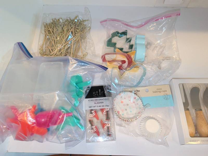 lot 1302 image: Baking and Party Supplies Lot Cookie Cutters, Baking Cups, Cheese Knives, Picks
