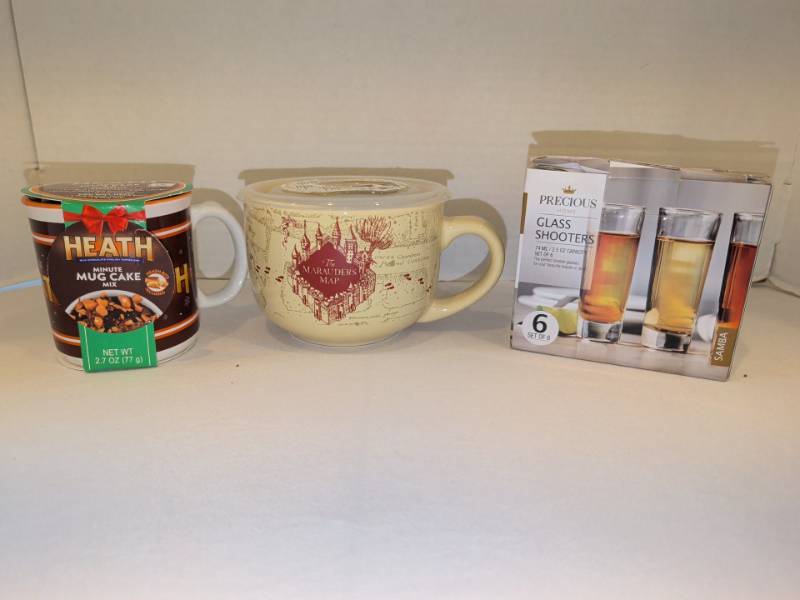 lot 1304 image: Lot Heath Minute Mug Cake Mix 2.7 oz, Marauders Map Soup Mug, shot glasses