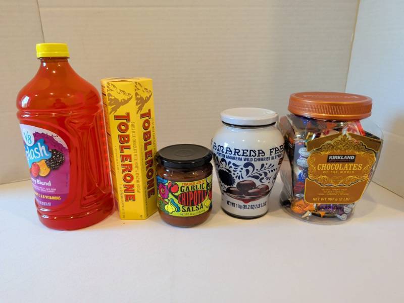 lot 1307 image: Assorted Food Lot V8 Splash, Toblerone, Trader Joes Salsa, Amarena cherries and Kirkland chocolate